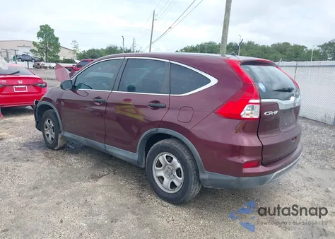 2015 Honda Cr-V Lx z USA, uszkodzony, nr VIN 2HKRM3H39FH528482
